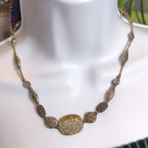 Ornate Necklace with Filigree Design